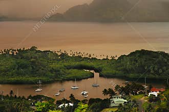 Savusavu marina and Nawi islet at sunset, Vanua Levu island, Fiji