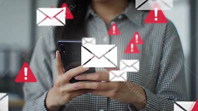 Person Holds Smartphone with Email Icons and Red Alerts Against Blurred Office Setting
