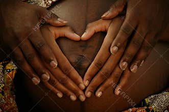 Lovely Couple's Hand On Pregnant Belly