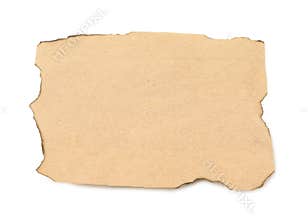 Piece of old paper with dark burnt borders isolated on white, top view