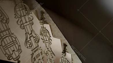 Walking up the historic spiral staircase in a historic building. Spiral stairs with wrought iron railings. View into the