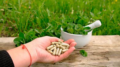 Peppermint extract essential oil and supplements. Selective focus.