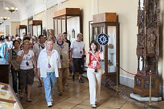 Tourists on guided tour in Hermitage