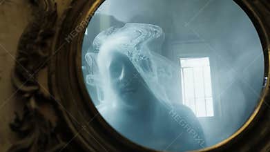 A creepy ghostly apparition in human form moves through an old haunted house