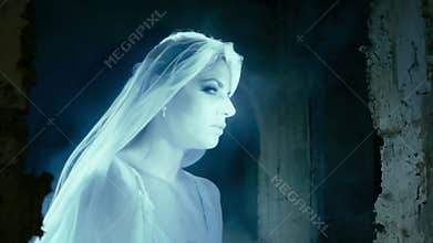 Close-up of a creepy ghostly apparition in human form in an old building