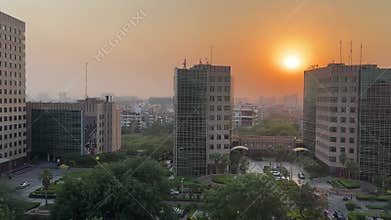 Aerial view of Global Business Park Building, Gurgaon, Haryana with orange sunset sky