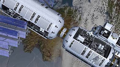 Space station and astronauts spacewalking