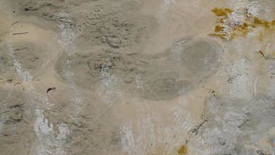Spring bursts out from underground, rising to the surface as bubbling water containing hydrogen sulfide