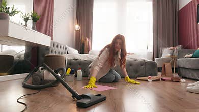 Woman housewife in gloves female housekeeper Caucasian girl housemaid washing floor house cleaning housekeeping chore