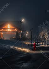Walking alone on a cold snowy night