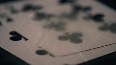 Playing cards clubs flush in smoke atmosphere