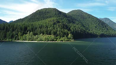 Mesmerizing view of Golden Ears Provincial Park, where North Beach meets the tranquil waters.