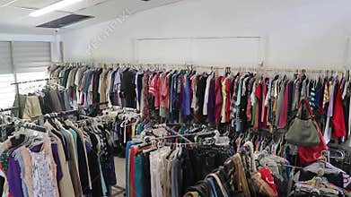 Thrift shop with different types of clothing and accessories