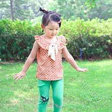 Girl dancing on the lawn