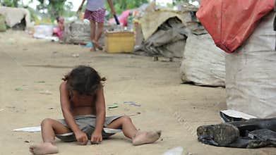 Cambodian kids in slums near phnom penh city dumping area