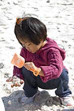 child digging for treasure
