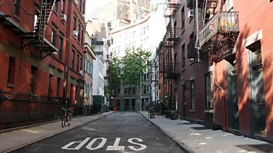 New York City building architecture. Urban residential house exterior. Real estate. Red brick facade