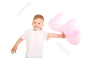 Boy giving heart balloons
