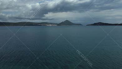 Aerial beach view with blue sea and clouds