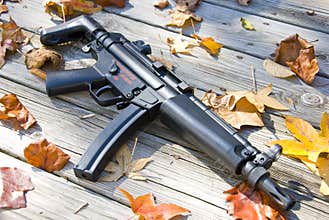 Sub machine gun in the fall
