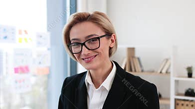 Portrait of confident businesswoman standing in office