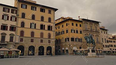 Piazza della Signoria with Cosimo I monument and cafes in town of Florence Italy