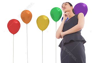 Composite image of thinking asian businesswoman