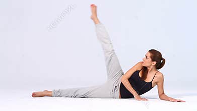 Fitness woman doing exercises on white