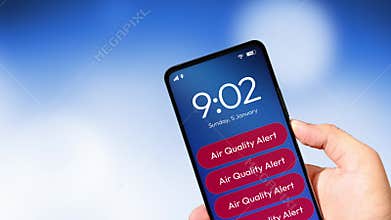 Smartphone Screen Displaying Multiple Red Air Quality Alert Notifications with Time