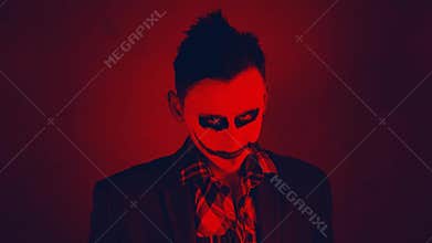 Creepy joker laughing