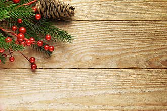 Christmas fir tree with decoration on a wooden