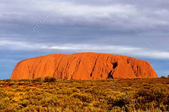 Picturesque landscape with orange colored Uluru Ayers Rock (Unesco), Australia