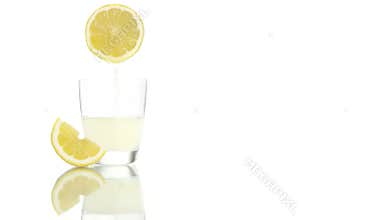 Squeezed lemon juice poured into the glass