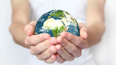 Earth in hands.