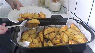 Baked potatoes on the pan
