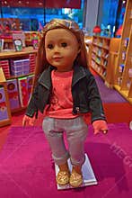 One of the American Girl characters on display in Fifth Avenue boutique shop, New York City