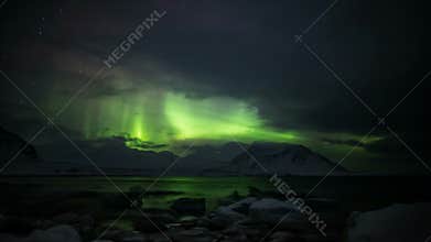 Northern Lights above the Arctic mountains and fjord