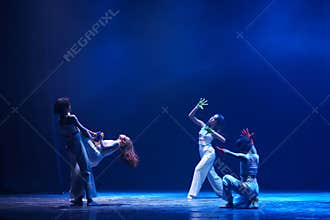 Expressive Contemporary Dance Lift Under Blue Stage Lighting