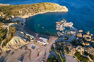 Aerial view of Limanaki cove and St. Nicholas chapel in Kolymbia, Rhodes island, Greece.
