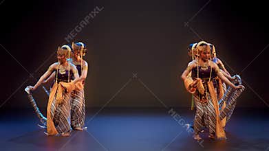 Traditional Female Dancers Displaying Snake Dance Props Together