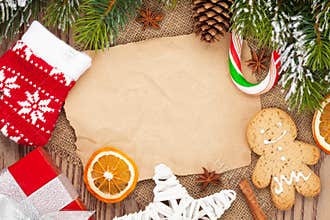 Christmas food and decor with snow fir tree background