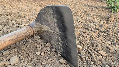 Sharp Agriculture Hoe Tool On Loose Soil In Bangladesh