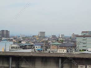 View of Takasaki, Japan from a train