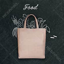 Bag with drawn food on a chalkboard
