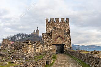 VELIKO TARNOVO, BULGARIA - MARCH 15, 2022: Entrance stone gate tower and bridge of Tsarevets Fortress