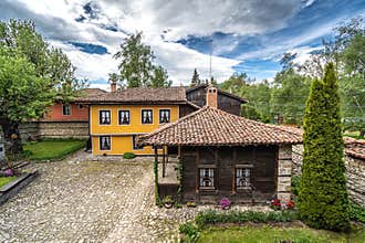 BULGARIA: Traditional Bulgarian revival style house in green mountain village