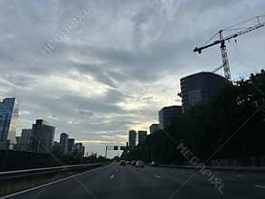 Driving on A10 Ring Road at Golden Hour Through Amsterdam Zuidas Business