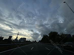 Driving on A10 Ring Road at Golden Hour Through Amsterdam Zuidas Business