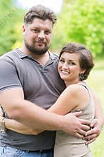 Beloved man and woman hugging each other