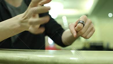 Magician doing tricks with a ring